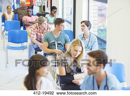 Nurse and patient talking in hospital View Large Photo Image Stock Image - Nurse and patient talking in hospital. Fotosearch