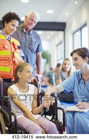 Nurse talking to patient in hospital View Large Photo Image Stock Photography - Nurse talking to patient in hospital. Fotosearch