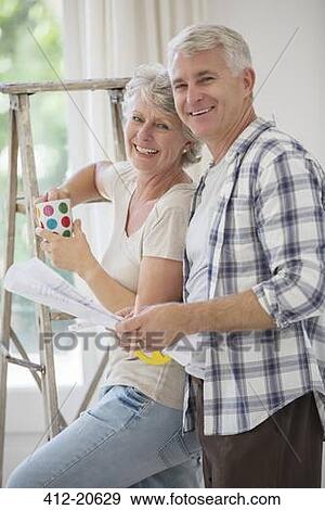 Older couple looking through documents together View Large Photo Image Stock Photo - Older couple looking through documents together. Fotosearch