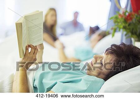 Patient reading in hospital room View Large Photo Image Stock Photograph - Patient reading in hospital room. Fotosearch