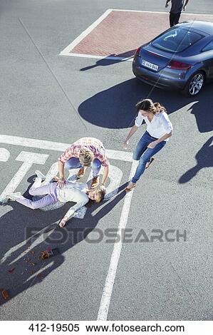 People rushing to injured girl on street View Large Photo Image Stock Photography - People rushing to injured girl on street. Fotosearch