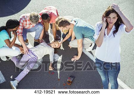 Woman calling emergency services at car accident View Large Photo Image Stock Image - Woman calling emergency services at car accident. Fotosearch