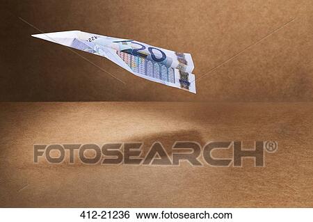 20 Euro note folded into paper airplane View Large Photo Image Stock Photograph - 20 Euro note folded into paper airplane. Fotosearch