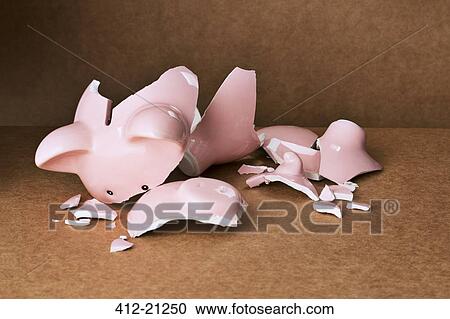 Broken piggy bank on counter View Large Photo Image Stock Image - Broken piggy bank on counter. Fotosearch