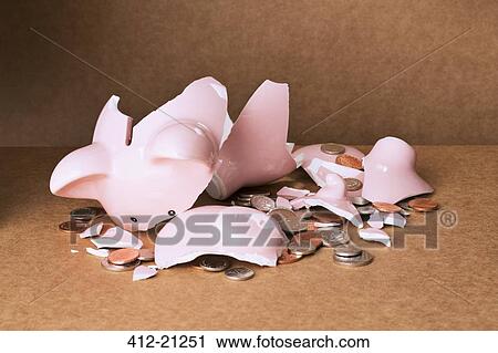 Broken piggy bank on counter View Large Photo Image Stock Image - Broken piggy bank on counter. Fotosearch