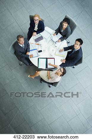 Business people having meeting at table View Large Photo Image Stock Image - Business people having meeting at table. Fotosearch