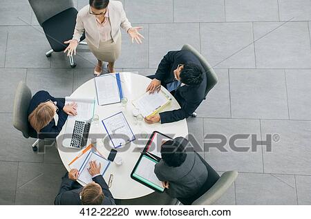 Business people having meeting at table View Large Photo Image Stock Image - Business people having meeting at table. Fotosearch