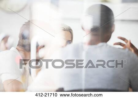 Business people having meeting in cafe View Large Photo Image Stock Image - Business people having meeting in cafe. Fotosearch