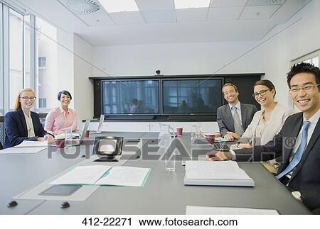 Business people having meeting View Large Photo Image Stock Image - Business people having meeting . Fotosearch