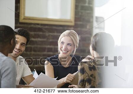 Business people meeting in office View Large Photo Image Stock Photo - Business people meeting in office . Fotosearch