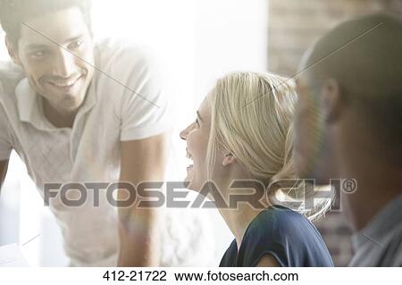 Business people talking in cafe View Large Photo Image Stock Image - Business people talking in cafe. Fotosearch