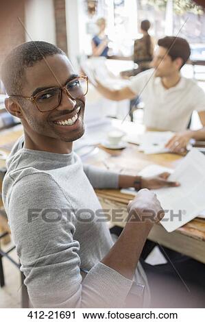 Businessman having meeting at cafe View Large Photo Image Stock Image - Businessman having meeting at cafe. Fotosearch