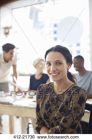 Businesswoman sitting in cafe View Large Photo Image Stock Image - Businesswoman sitting in cafe. Fotosearch
