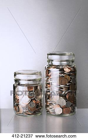 Change jars sitting on counter View Large Photo Image Stock Photo - Change jars sitting on counter. Fotosearch