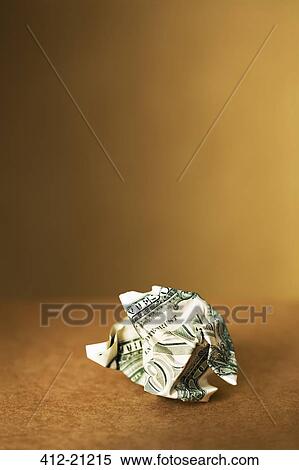 Stock Photography - Close up of crumpled dollar bill on counter. Fotosearch