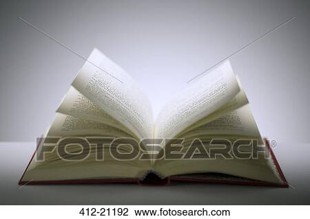 Close up of open book on counter View Large Photo Image Stock Image - Close up of open book on counter. Fotosearch