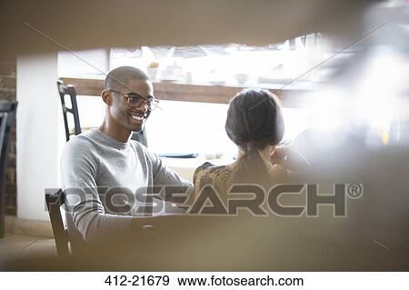 Couple talking in cafe View Large Photo Image Stock Photo - Couple talking in cafe. Fotosearch