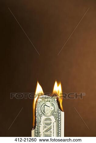 Folded dollar bill burning View Large Photo Image Stock Image - Folded dollar bill burning. Fotosearch
