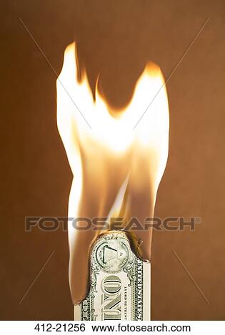 Folded dollar bill burning View Large Photo Image Stock Photograph - Folded dollar bill burning. Fotosearch
