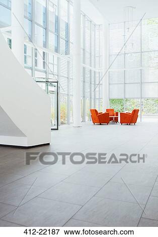 Light shining through windows in office building View Large Photo Image Stock Photo - Light shining through windows in office building. Fotosearch