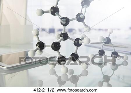 Molecular model and digital tablet on counter in lab View Large Photo Image Stock Image - Molecular model and digital tablet on counter in lab. Fotosearch