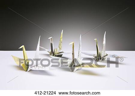 Origami cranes made of Euros on counter View Large Photo Image Picture - Origami cranes made of Euros on counter. Fotosearch