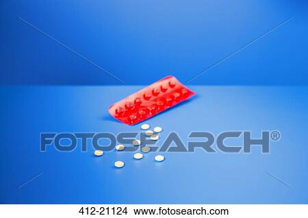 Prescription pills by blister pack on blue counter View Large Photo Image Picture - Prescription pills by blister pack on blue counter. Fotosearch