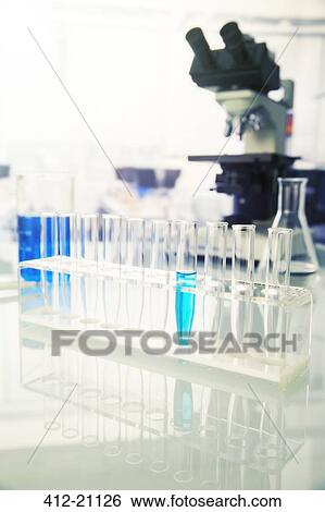 Rack of test tubes with solution in lab View Large Photo Image Stock Photograph - Rack of test tubes with solution in lab. Fotosearch