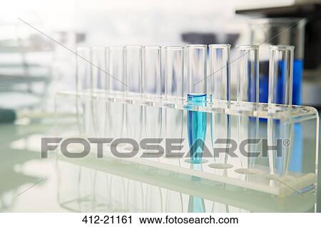 Rack of test tubes with solution on counter in lab View Large Photo Image Stock Image - Rack of test tubes with solution on counter in lab. Fotosearch