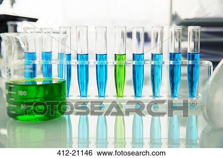 Rack of test tubes with solution on counter in lab View Large Photo Image Stock Photograph - Rack of test tubes with solution on counter in lab. Fotosearch