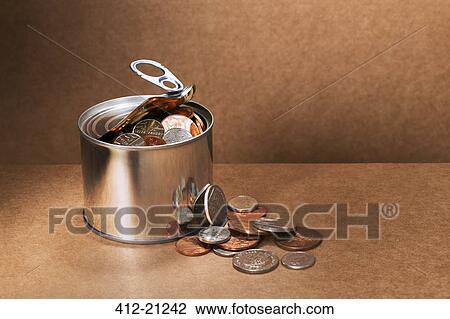 Sealed can overflowing with change View Large Photo Image Stock Image - Sealed can overflowing with change. Fotosearch