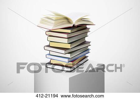 Stack of books on pedestal View Large Photo Image Picture - Stack of books on pedestal. Fotosearch