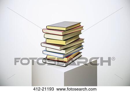 Stack of books on pedestal View Large Photo Image Stock Image - Stack of books on pedestal. Fotosearch