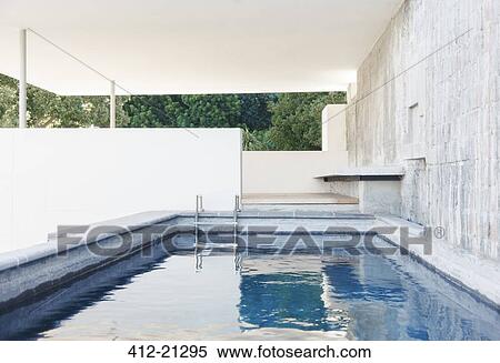 Stone wall and steps in covered pool View Large Photo Image Stock Photography - Stone wall and steps in covered pool. Fotosearch