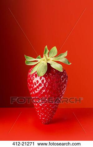 Strawberry on red counter View Large Photo Image Stock Image - Strawberry on red counter. Fotosearch