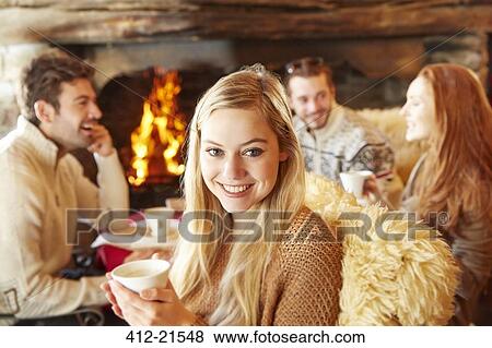 Woman enjoying drinks with friends View Large Photo Image Stock Photo - Woman enjoying drinks with friends. Fotosearch