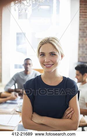 Stock Photo - Woman smiling in cafe. Fotosearch