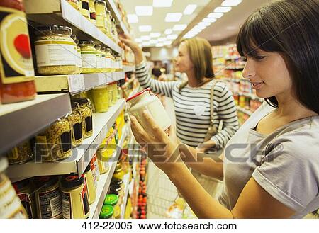 Women shopping in grocery store View Large Photo Image Stock Photography - Women shopping in grocery store. Fotosearch