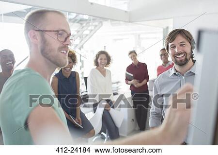 Business people having meeting in office View Large Photo Image Picture - Business people having meeting in office. Fotosearch