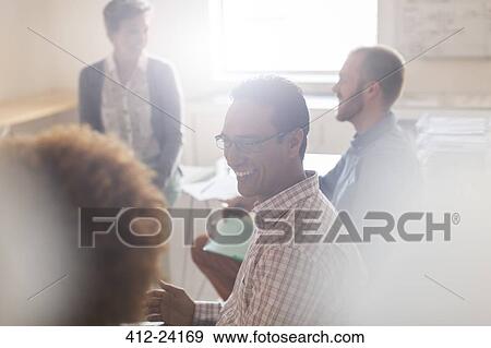 Business people working in office View Large Photo Image Stock Photo - Business people working in office. Fotosearch