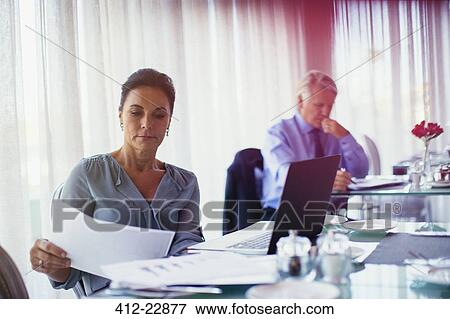 Business woman and business man working in restaurant View Large Photo Image Stock Photo - Business woman and business man working in restaurant. Fotosearch