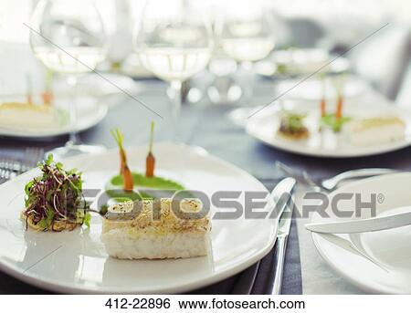 Stock Photograph - Close up of fancy fish meal on table. Fotosearch