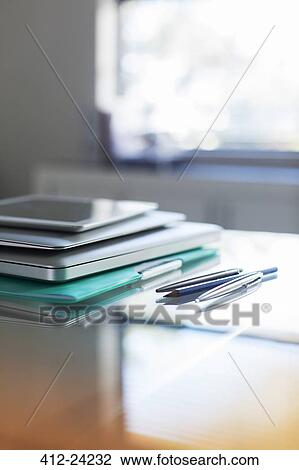 Documents and digital tablet on desk in office View Large Photo Image Stock Image - Documents and digital tablet on desk in office. Fotosearch