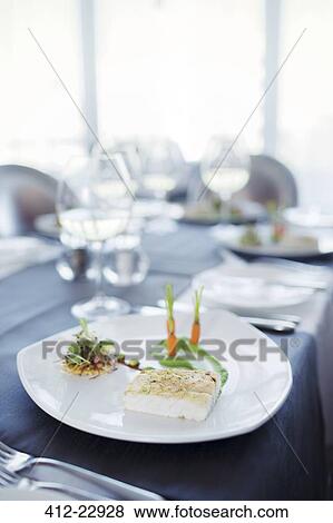 Fancy fish meal on plate in restaurant View Large Photo Image Stock Photo - Fancy fish meal on plate in restaurant. Fotosearch
