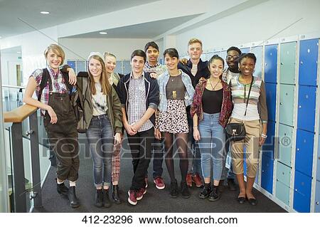Stock Photograph - Group of students posing in corridor. Fotosearch