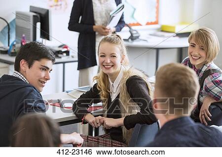 High School students sitting and smiling in classroom View Large Photo Image Stock Photograph - High School students sitting and smiling in classroom. Fotosearch