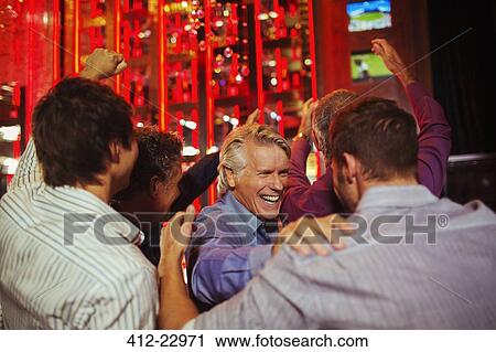 Men having fun in bar View Large Photo Image Stock Image - Men having fun in bar. Fotosearch