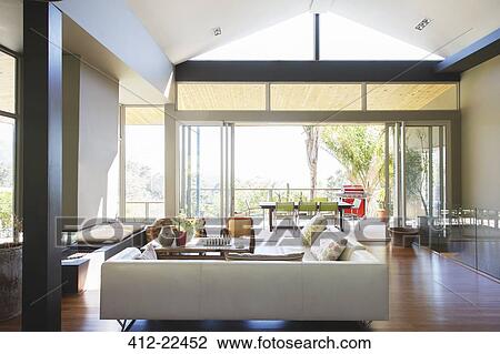 Modern living room with large sofas and coffee table View Large Photo Image Stock Image - Modern living room with large sofas and coffee table. Fotosearch