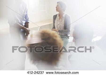 People having meeting in office View Large Photo Image Stock Photo - People having meeting in office. Fotosearch