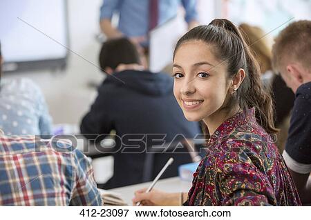 Portrait of teenage student in classroom View Large Photo Image Stock Photo - Portrait of teenage student in classroom. Fotosearch